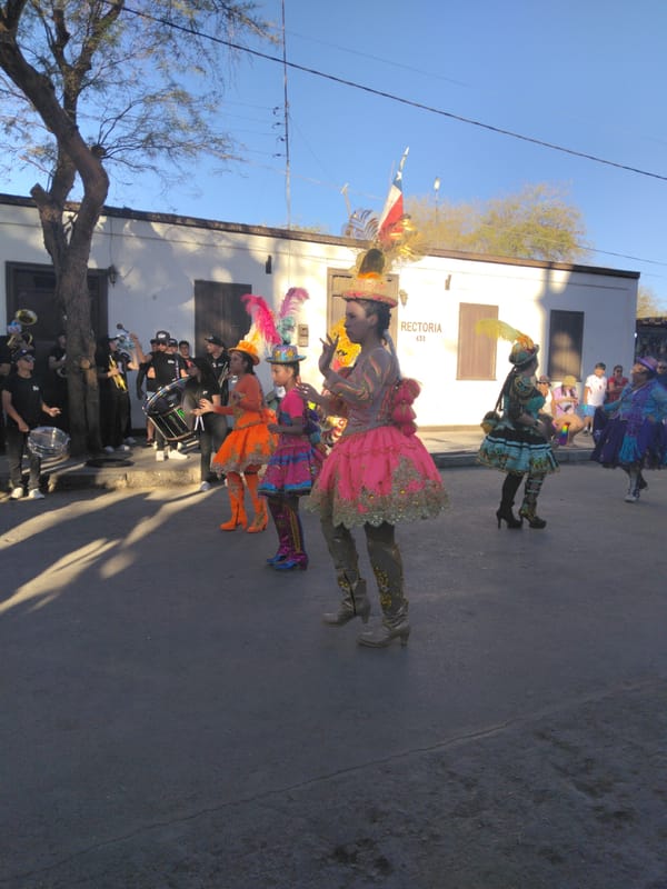Traditional costume parade through the streets of Pozo Almonte, Chile
