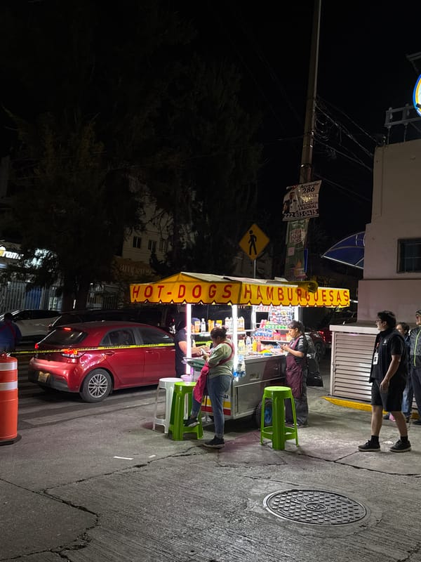 Late-night food cart serves customers in Puebla, Mexico