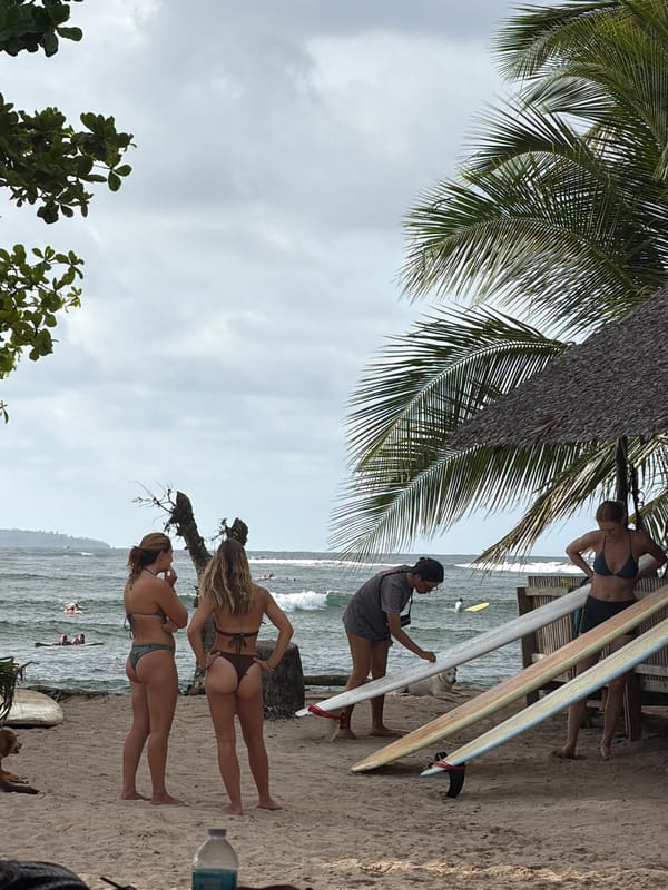 Two women spotted on General Luna beach under cloudy skies