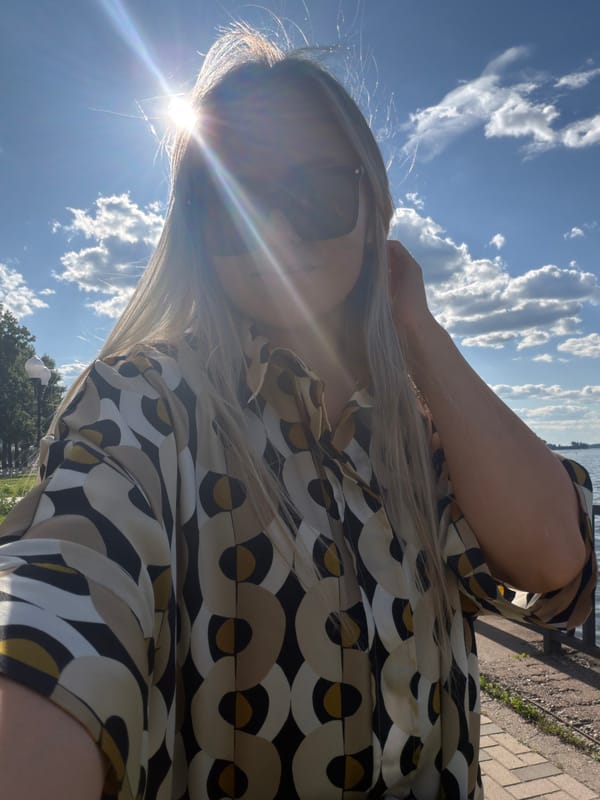 Woman takes sunny day selfies in Votkinsk, Russia