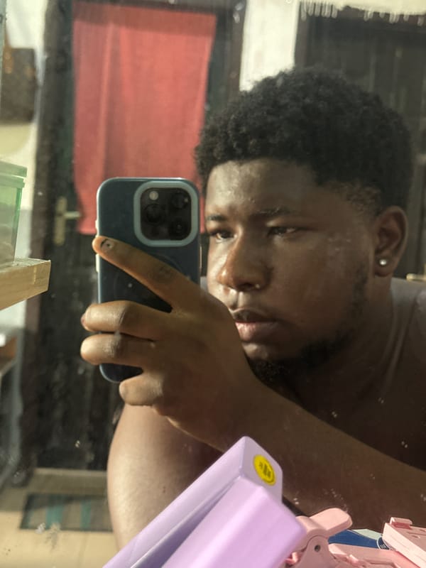 Man takes mirror selfies in Nigerian bathroom locations