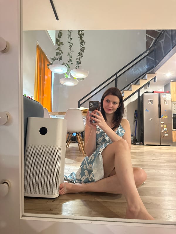 Selfie session in a sunny room, plus a toy vehicle flat lay