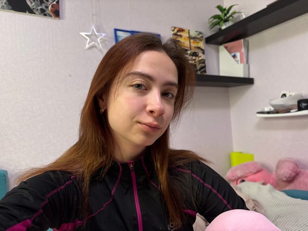 Woman documents personal moments in early morning selfie session