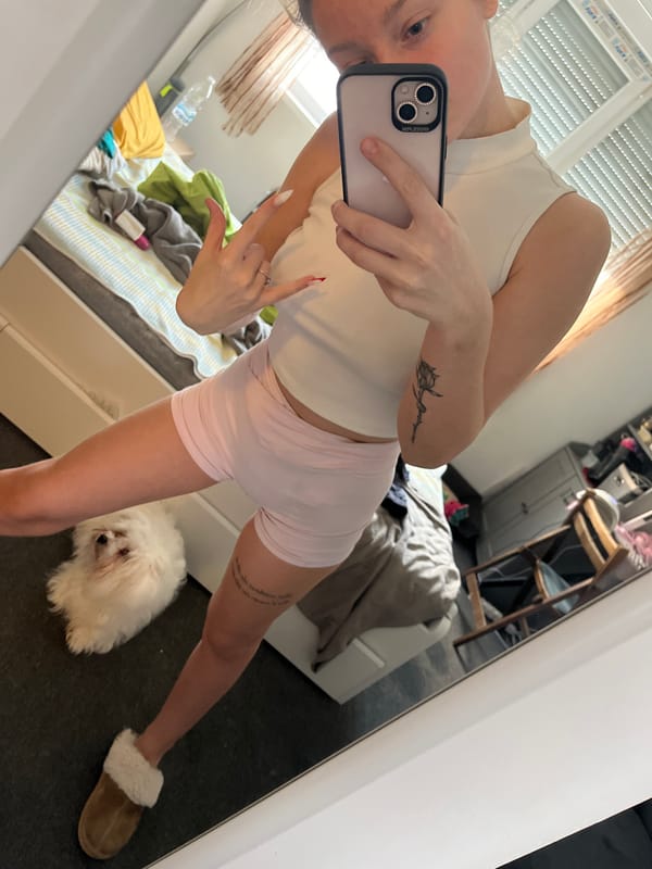 Person Takes Mirror Selfie with Peace Sign in Varna