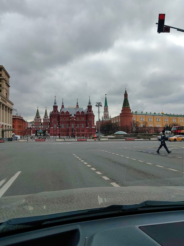 Vehicle drives through empty Red Square, Moscow morning