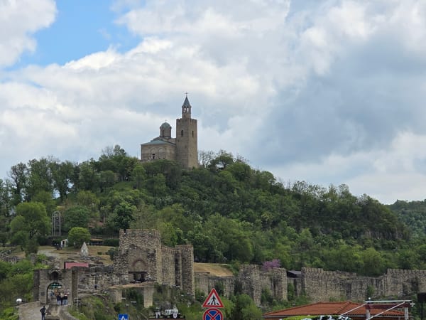 European town scenes captured: church, streets, pigeons, birthday celebrations