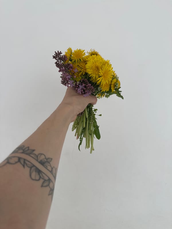 Person takes flower bouquet selfies in Votkinsk, Russia