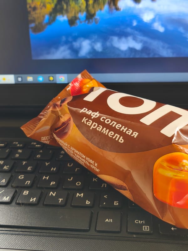 Afternoon snack break documented in Belarus with chocolate and apple