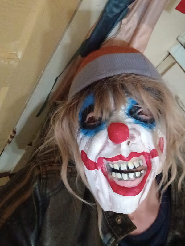 Early morning documentation of spiders and clown mask in Clarksville