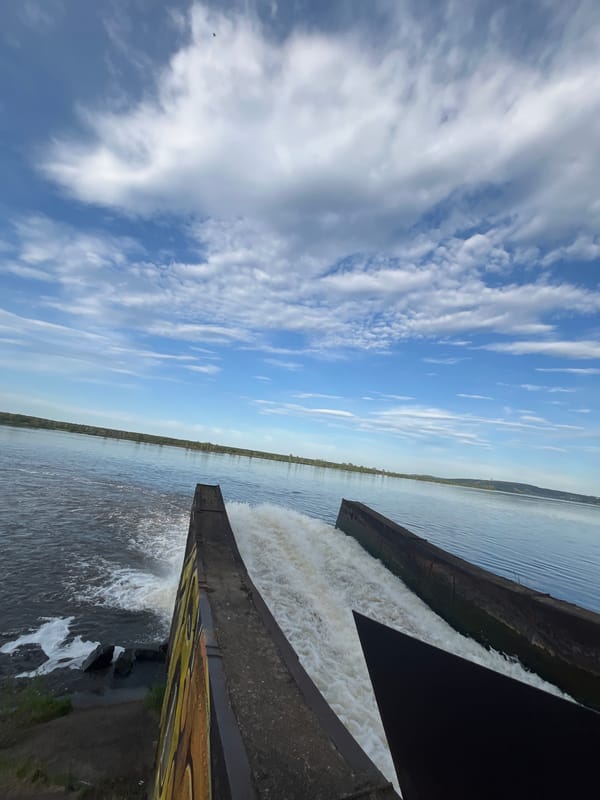 Water flows through Chernushka dam structures in Russia