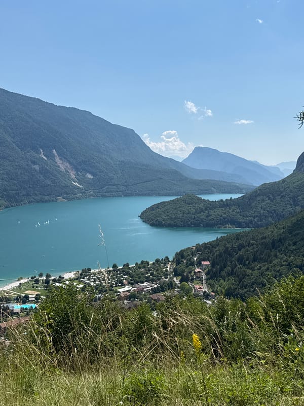 Molveno Lake and its alpine surrounds on a clear summer day