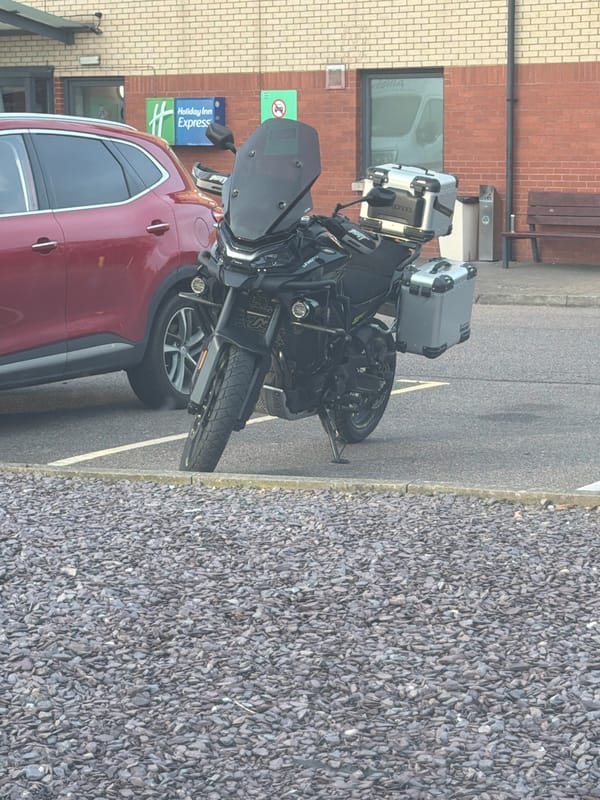 Motorcycle parked near Holiday Inn Express in Luton