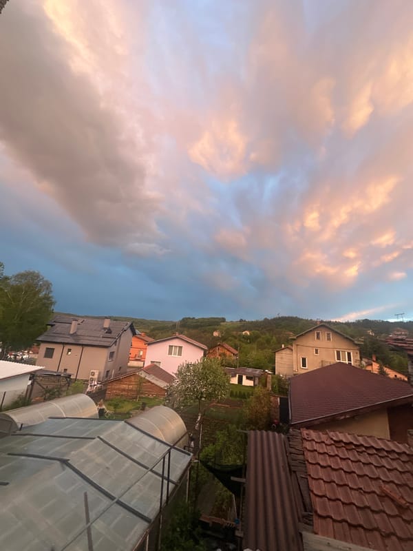 Dusk weather changes captured over Bulgarian village rooftops