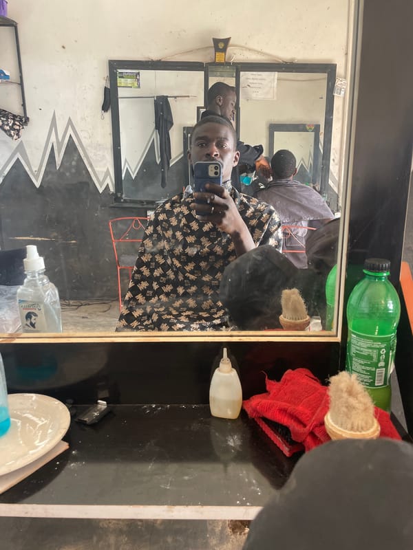 Everyday barbershop scenes captured in Durimi, Nigeria