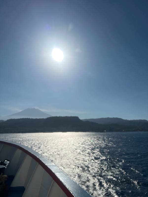 Ferry crossing near Ketapang with coastline and mountains ahead