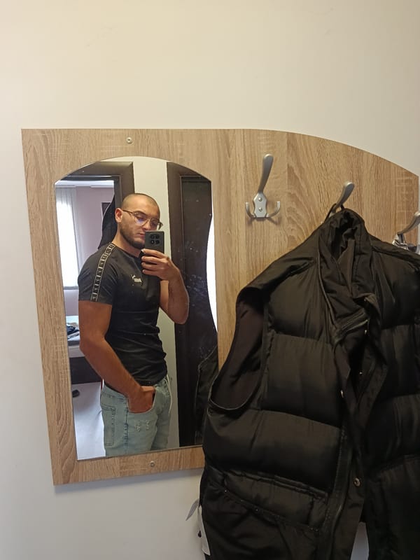 Man takes mirror selfie in Plovdiv entryway