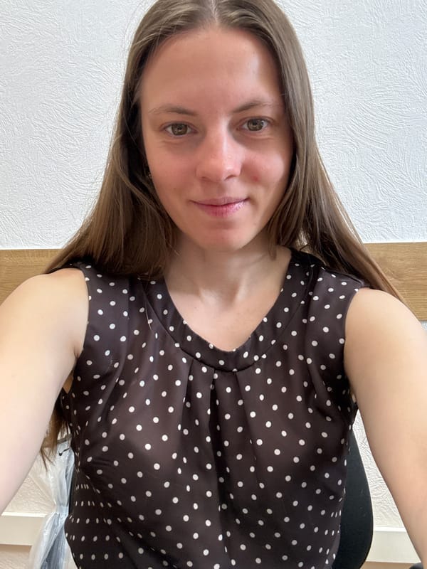 Woman documents late-night outfit changes in Chaikovsky selfie session
