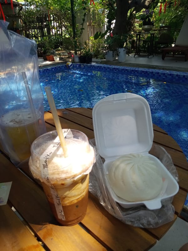 Early morning poolside refreshments documented in Vietnamese heritage area