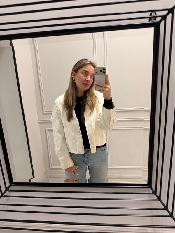 Woman takes selfies in Moscow urban setting