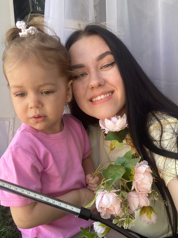 Mother and toddler share quiet morning moments in Chaikovsky
