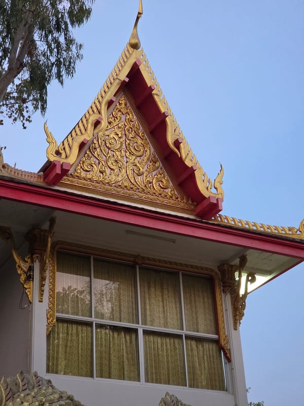 Tourist documents Buddhist temples and statues across Pattaya