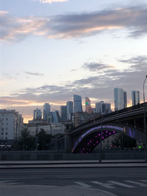 Moscow skyline glows during golden hour sunset over the river