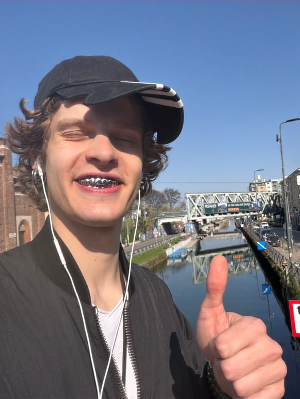 Young man documents afternoon walk through Milan neighborhoods