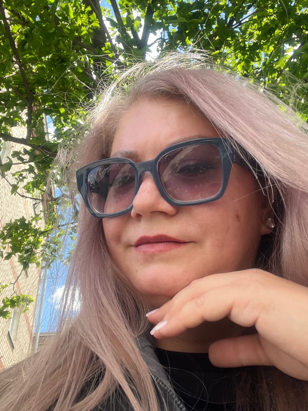 Woman takes selfies in Izhevsk during morning hours