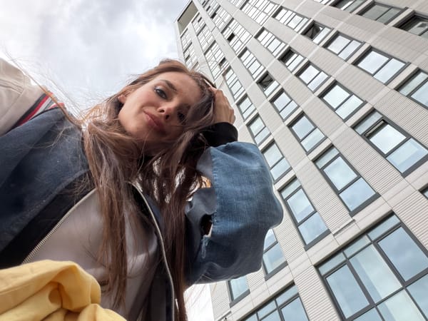 Selfies outside a modern building in Ufa, Russia