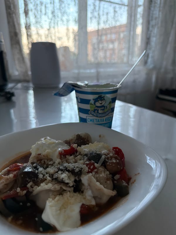 Meal preparation and gratitude documented in Leningradskaya, Russia