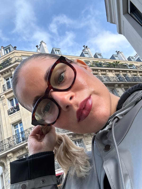 Woman takes selfies during Paris public transport commute