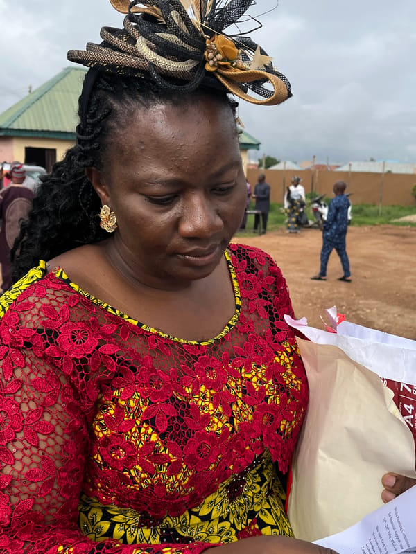 Religious community gathering in Jos, Nigeria, dressed for the occasion