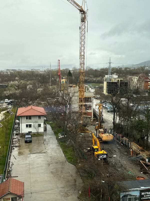 Construction crane towers over active building site in Sofia