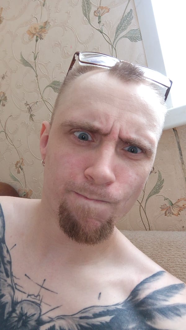 Quick selfie series, glasses and goatee, expressive faces