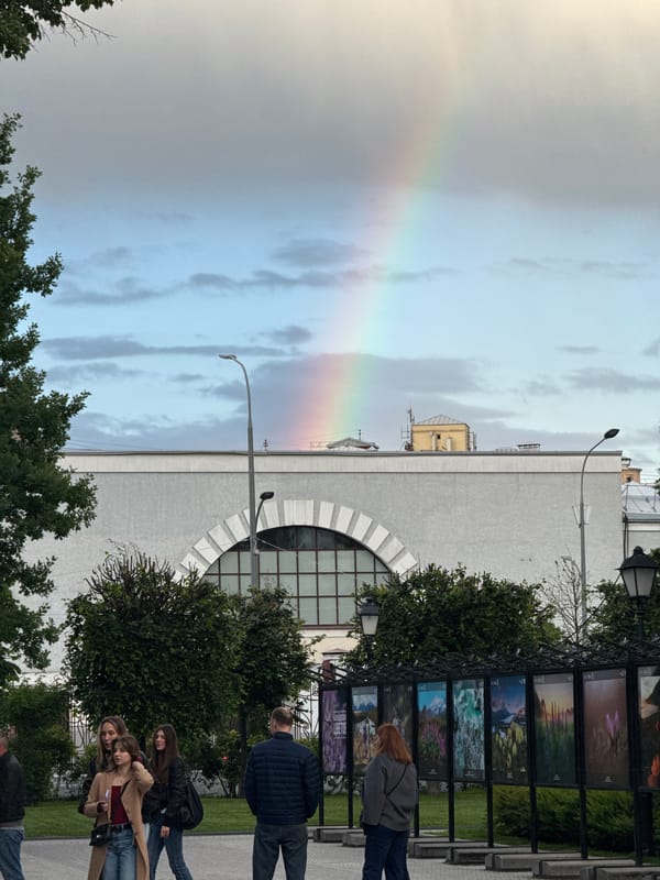 Rainbow spans Moscow skyline during afternoon weather event