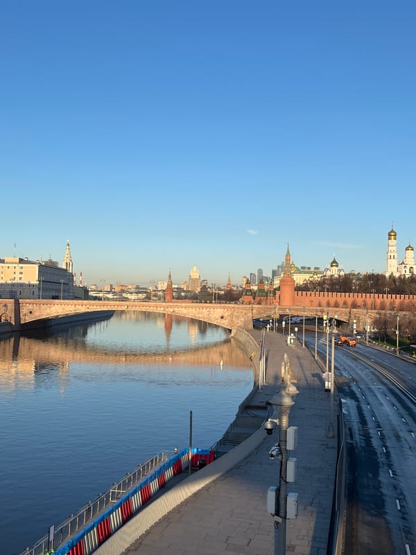Early morning Kremlin reflection captured on Moscow riverbank