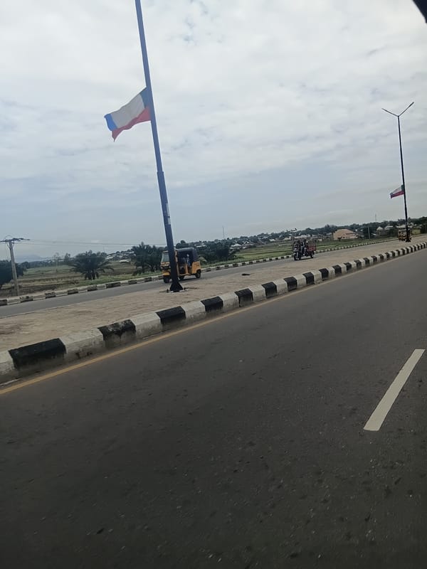 Jalingo streets, river crossings, and daily transport on a cloudy morning