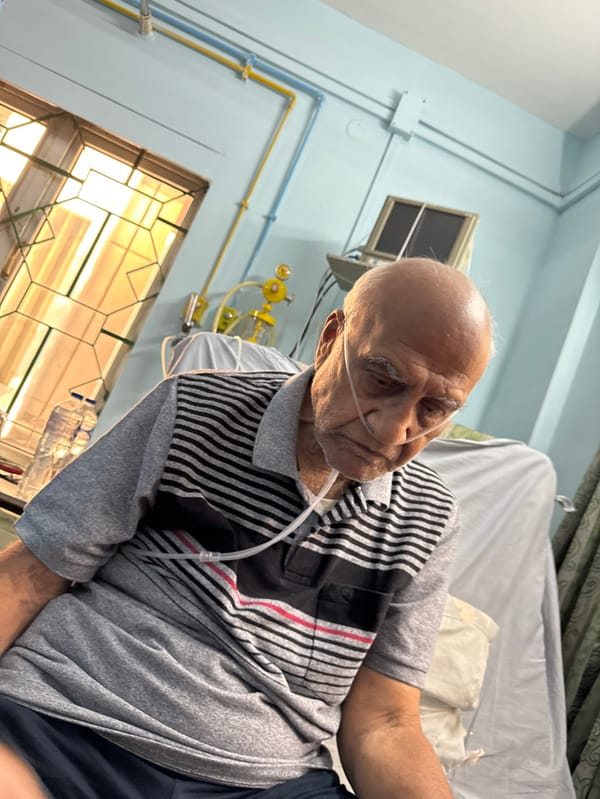 Elderly patient receives hospital care in Kolkata with family present