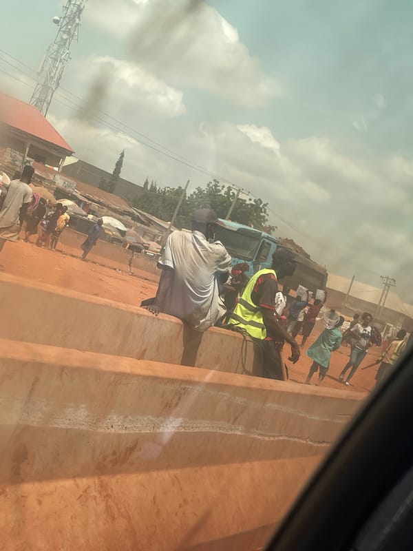 Street vendors and construction activity documented in Ado, Nigeria