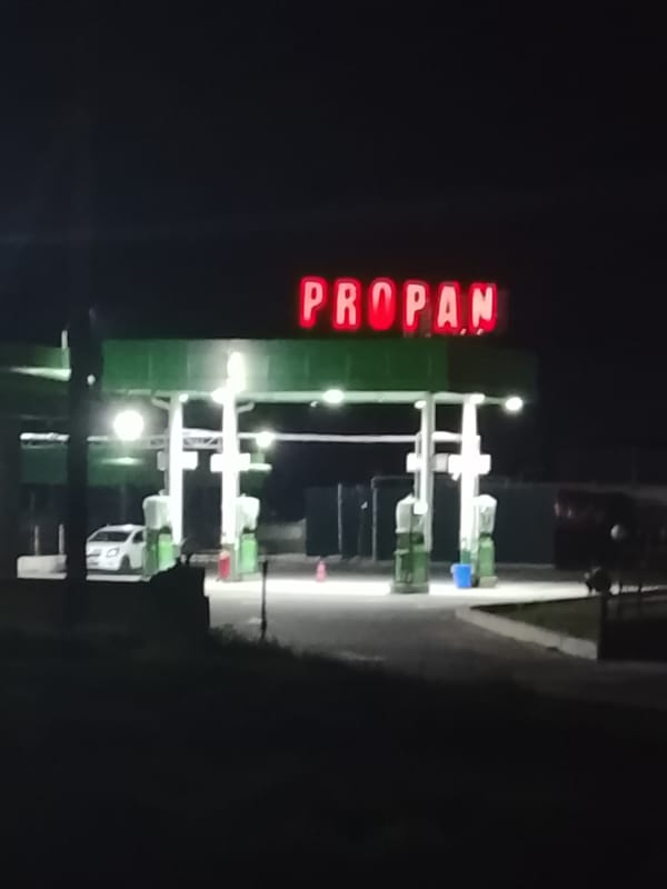 Man takes selfie at Propan gas station in Uzbekistan
