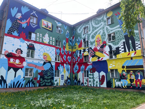 Street life documented in Vologda featuring murals and urban scenes