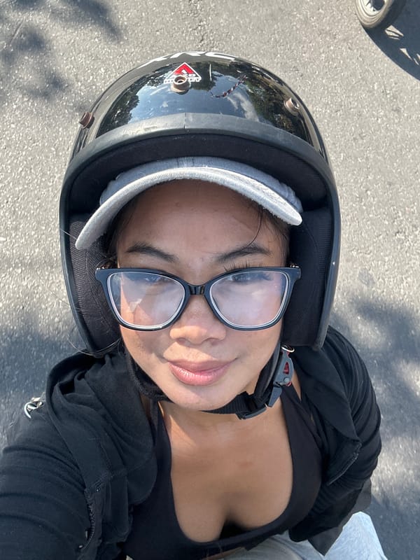 Scooter ride through Sukawati past Balinese temples and streets