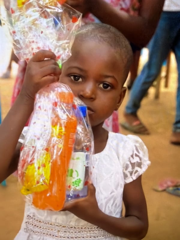 Food distribution and gathering at a children's orphanage