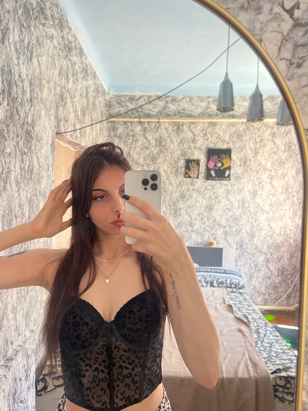 Mirror selfies in leopard print and pearls, Moldova