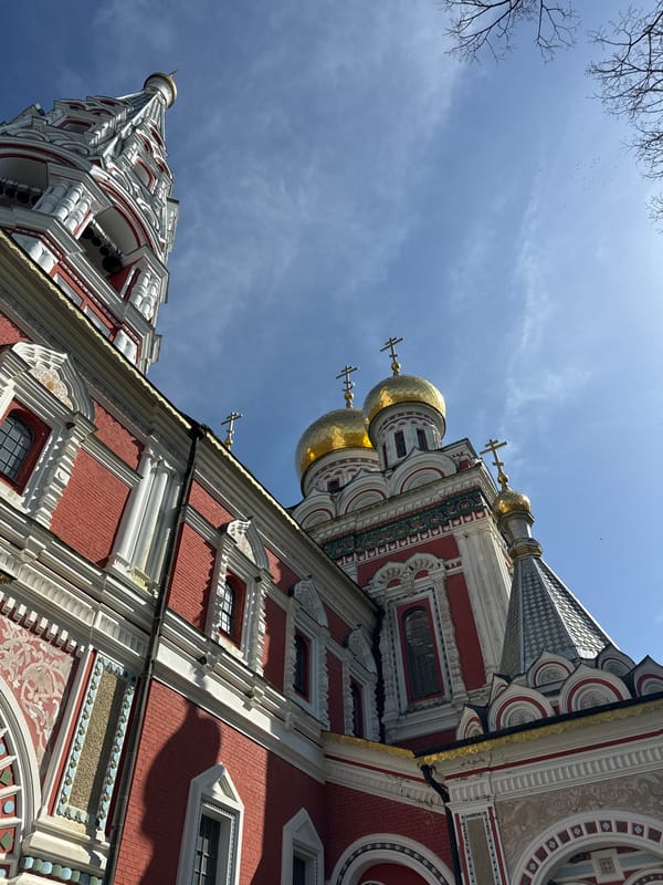 Tourist photographs historic Shipka Memorial Church in Bulgaria