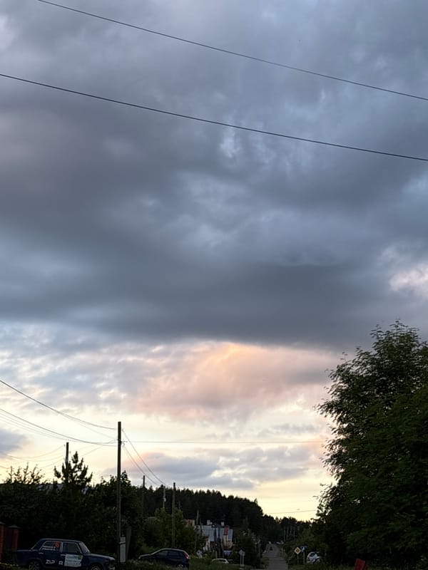 Overcast afternoon captures ordinary life in Прикамский, Russia