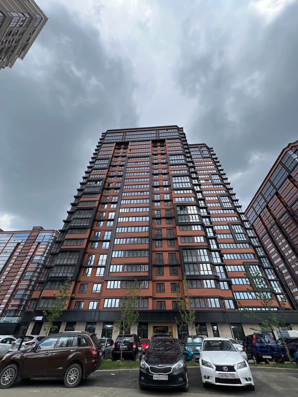 Modern brick apartment complex in Krasnodar, multiple angles
