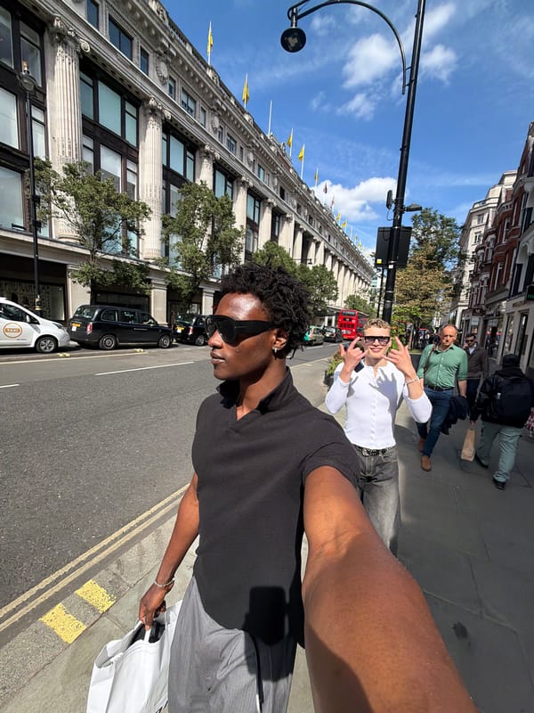 Two men take selfie on sunny London street