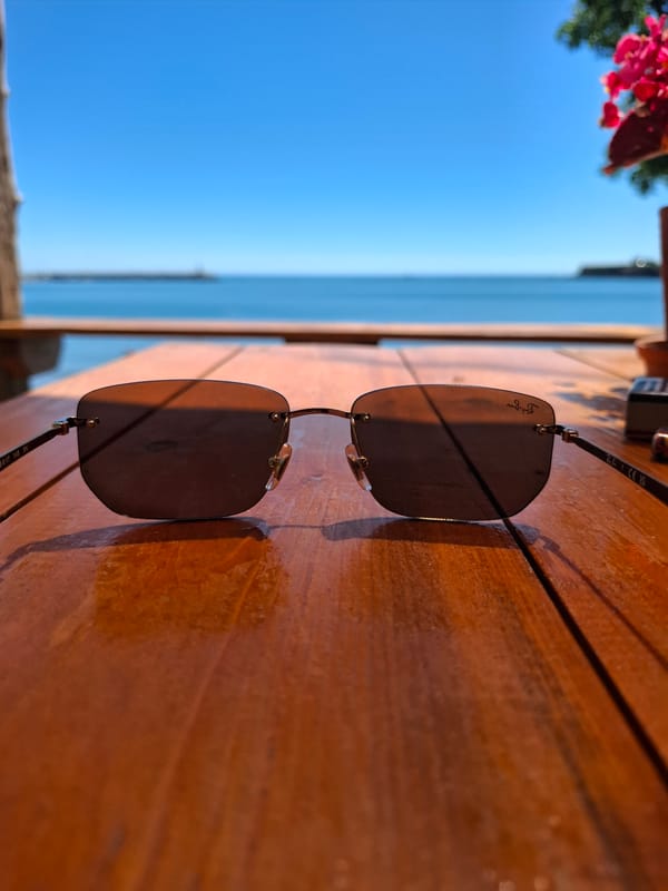 Sunglasses on a table at a seaside cafe in Tsarevo