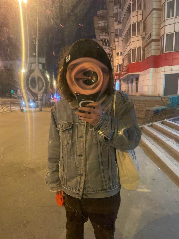 Person takes selfies around Yekaterinburg with small white dog